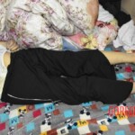 Dead young chinese girl in bed
