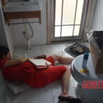 Dead woman in red dress