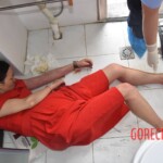 Dead woman in red dress