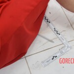 Dead woman in red dress