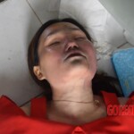 Dead woman in red dress