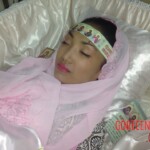 Dead woman in coffin