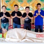 Preparing dead body of woman for burial