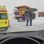 Woman crushed by haul truck