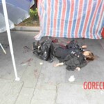 Woman feel from building