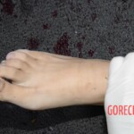 Woman feel from building