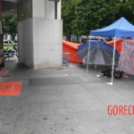 Woman feel from building