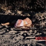 Woman's corpse found on sandy road