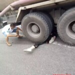 Girl under agitating lorry