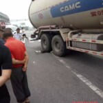 Girl under agitating lorry
