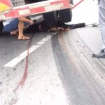 Girl under agitating lorry