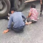 Girl under agitating lorry