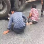 Girl under agitating lorry