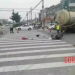Girl under agitating lorry