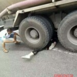 Girl under agitating lorry