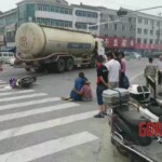 Girl under agitating lorry