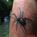 Spider tattoo scarification