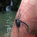 Spider tattoo scarification