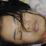 Examination of dead Chinese woman