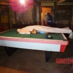 Murdered woman on pool table