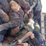 Dead female Kurdish soldier