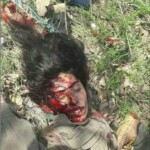 Dead female Kurdish soldier