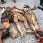 Dead female Kurdish soldier