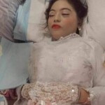 Asian woman in open coffin