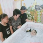 Funeral of Asian woman in uniform