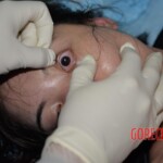 Initial examination of dead woman by forensic pathologists