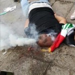 Demostrant hit by tear grenade to the head