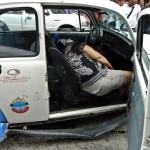 Woman shot dead while travelling in taxi