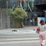 Aftermath of young Chinese woman's suicide jump