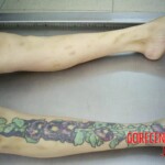Tattooed woman in morgue