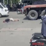 Vietnamese woman on scooter hit & run over by truck