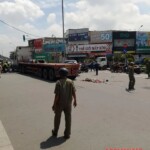 Vietnamese woman on scooter hit & run over by truck