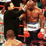 Mike Tyson bites off ear of his opponent Evander Holyfield