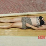 Examination of dead Chinese woman