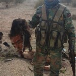 Syrian soldiers taking photos with severed rebel heads