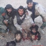 Syrian soldiers taking photos with severed rebel heads