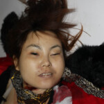 Raped and slashed Chinese woman