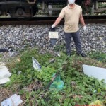 Young Vietnamese guy on scooter hit by train