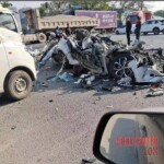 Car loses control and hits truck, one dead