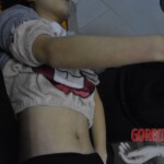 Young Chinese woman in morgue