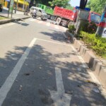 Chinese woman under truck wheel after accident