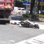 Chinese woman under truck wheel after accident