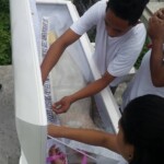 Funeral of Indonesian woman with open casket