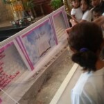 Funeral of Indonesian woman with open casket