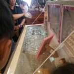 Funeral of Indonesian woman with open casket