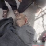Syrian man documents dead bodies of his family members